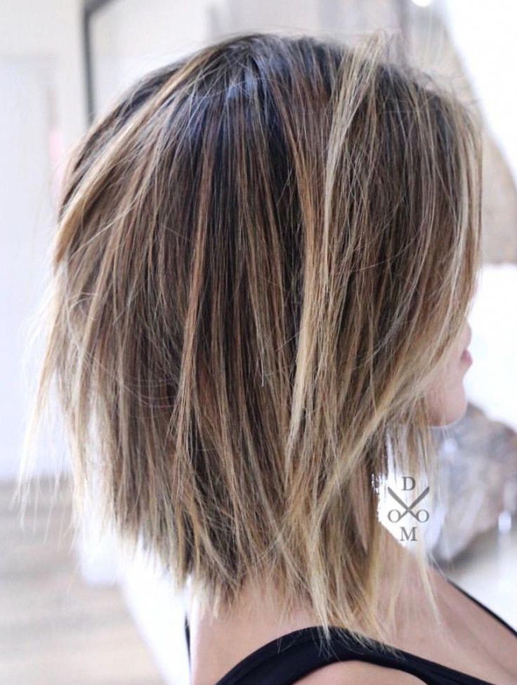 13 Edgy Choppy Layered Long Bob with Straight Bangs for 2024 4