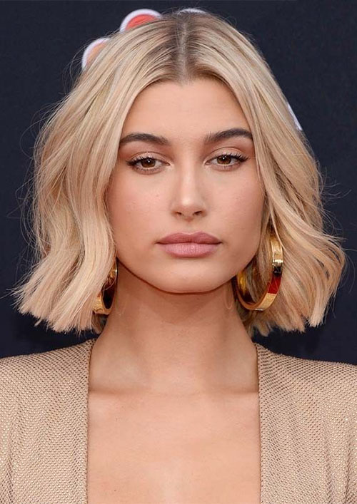 The best Blunt Bob with a Deep Side Part and Angled Bangs this year 4